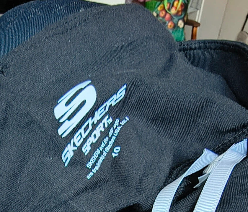 Skechers black bicycle tights high waist with matte finish and logo detail on leg.