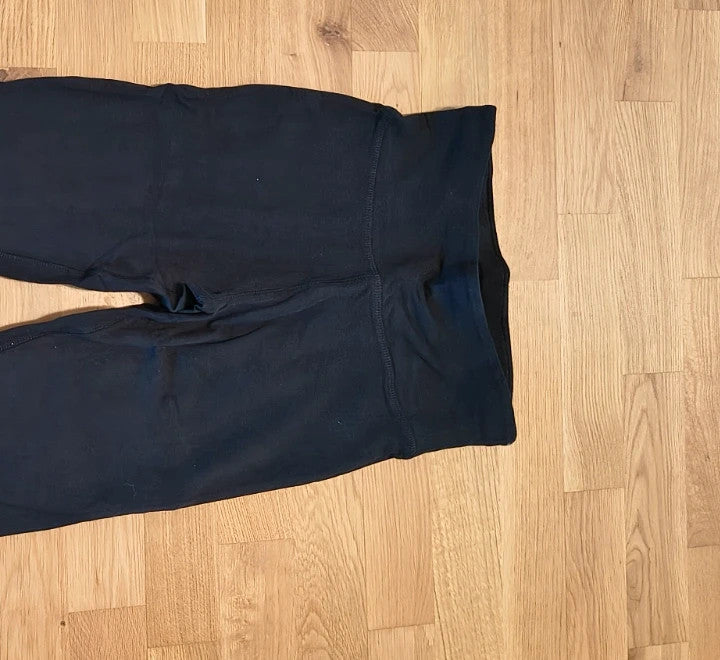 Skechers black bicycle tights high waist with matte finish and logo detail on leg.