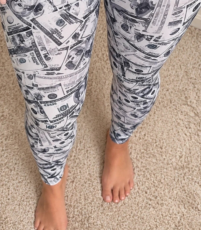 SheIn grey and white bicycle tights high-waisted with dollar bill print pattern.