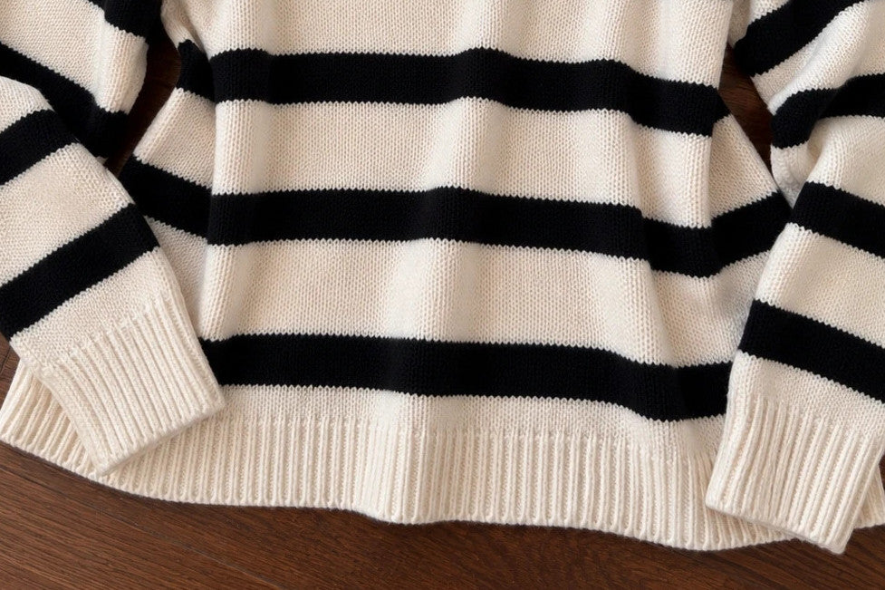 ONLY oversized pullover cream and black striped with logo, new with tags.
