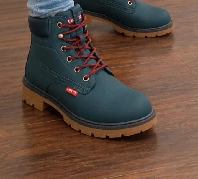 Levi's blue junior boots with contrasting laces, padded shaft, and rugged sole.