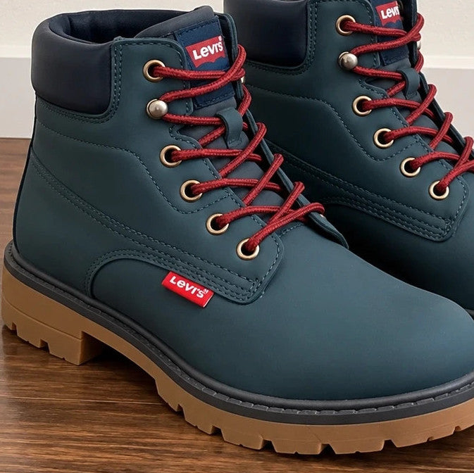 Levi's blue junior boots with contrasting laces, padded shaft, and rugged sole.
