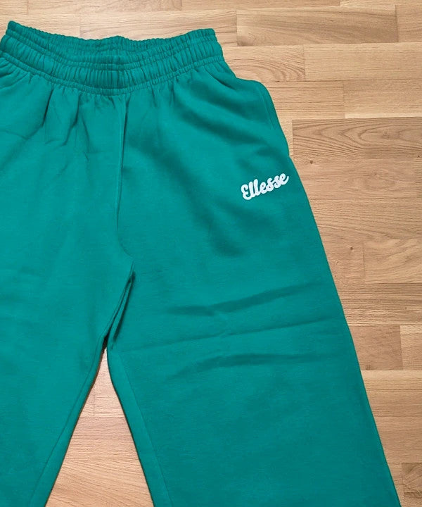 Ellesse green wide-leg jogging pants with logo, elastic waistband, and side pockets.