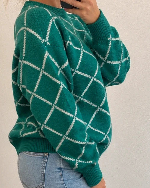 ONLY green pullover with white diamond pattern, slightly oversized, brand label attached.