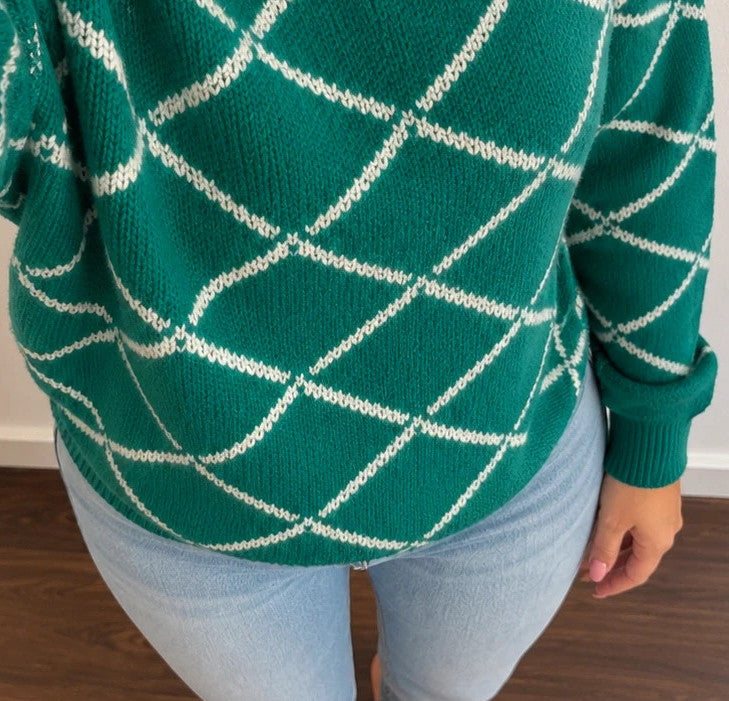 ONLY green pullover with white diamond pattern, slightly oversized, brand label attached.