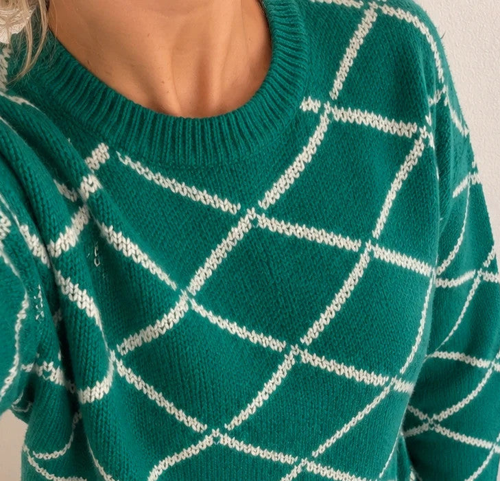 ONLY green pullover with white diamond pattern, slightly oversized, brand label attached.