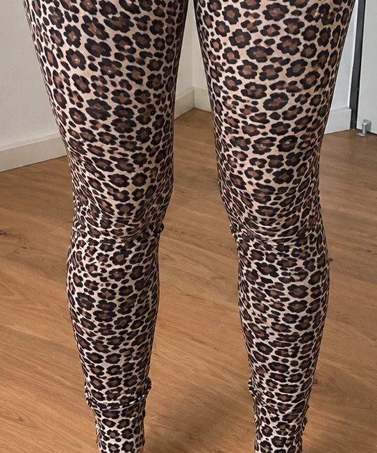 SheIn black and brown leopard print bicycle tights with elastic waistband and fitted design.