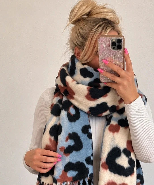 XXL multi shawl featuring plush leopard print in cream, light blue, black, and brown.