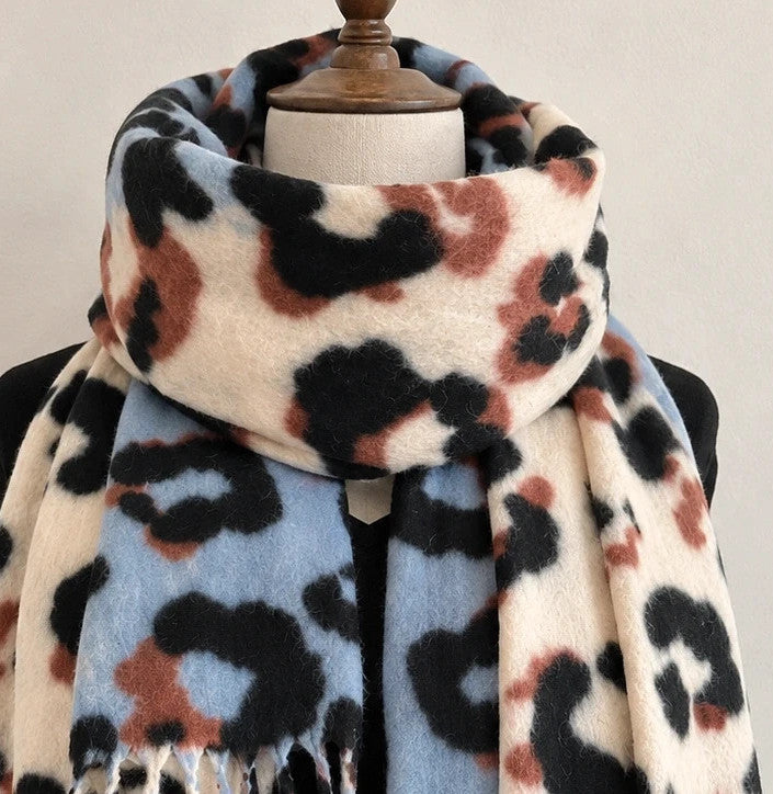 XXL multi shawl featuring plush leopard print in cream, light blue, black, and brown.