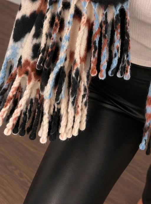 XXL multi shawl featuring bold leopard print in cream, light blue, brown, and black with fringe.
