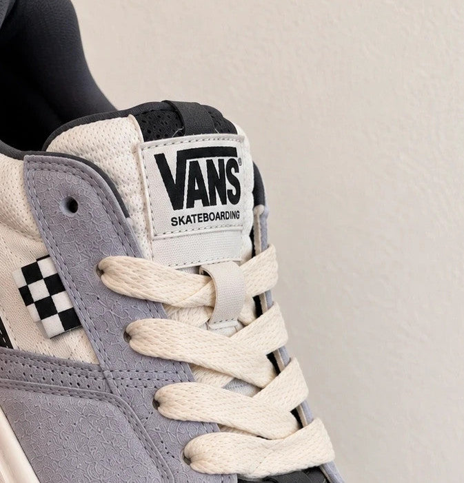 VANS grey trainers with cream and black checkerboard detail, padded tongue, and original box.