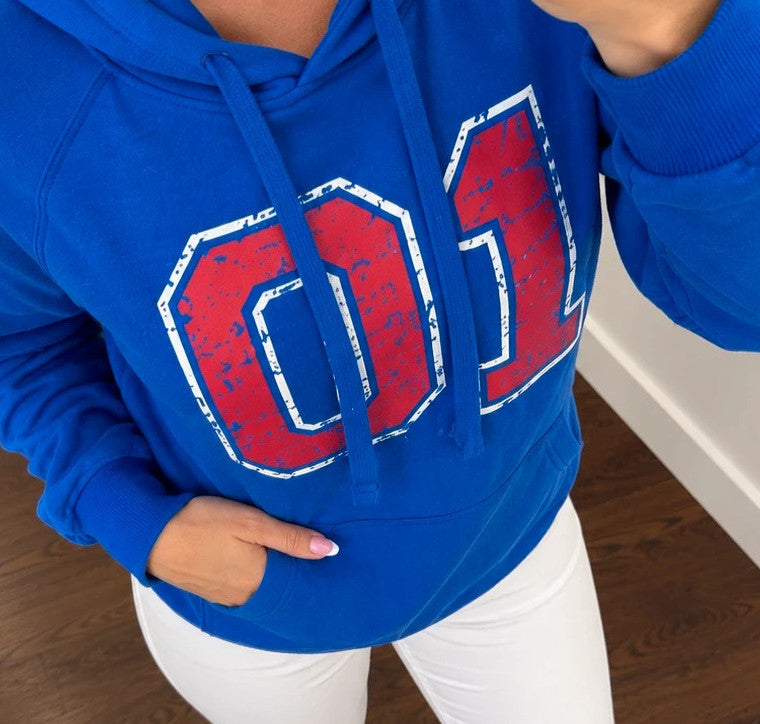 Shamp blue hoodie with large red and white 01 print, drawstring hood, kangaroo pocket.
