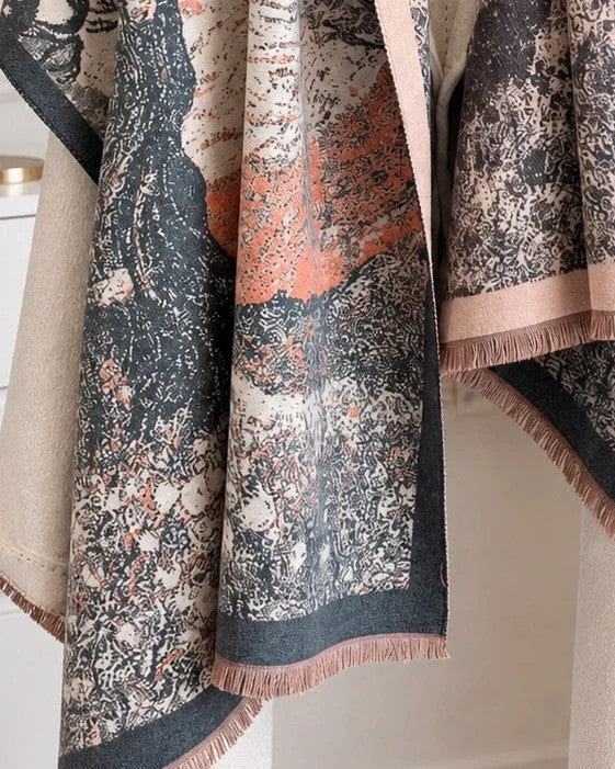 Creme multi shawl with artistic tree motif and decorative fringes, soft polyester material.