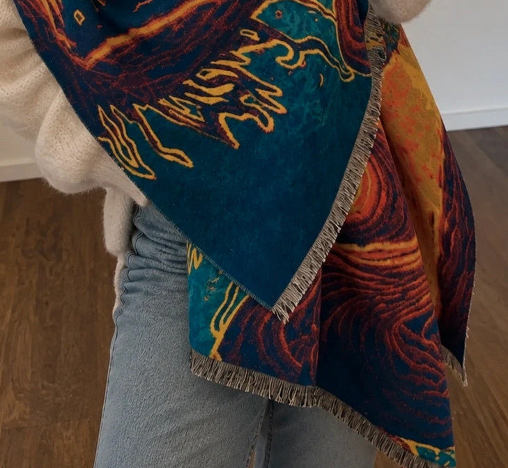 Farben multi shawl featuring artistic landscape design with fringed edges, 100% polyester.