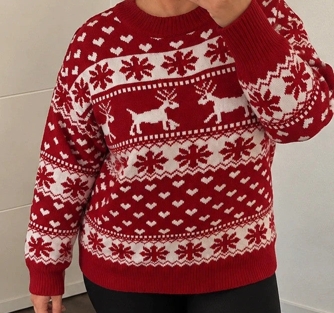 SheIn red and white Christmas sweater with reindeer, snowflakes, and ribbed cuffs.