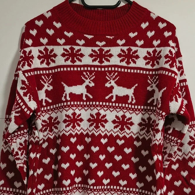 SheIn red and white Christmas sweater with reindeer, snowflakes, and ribbed cuffs.