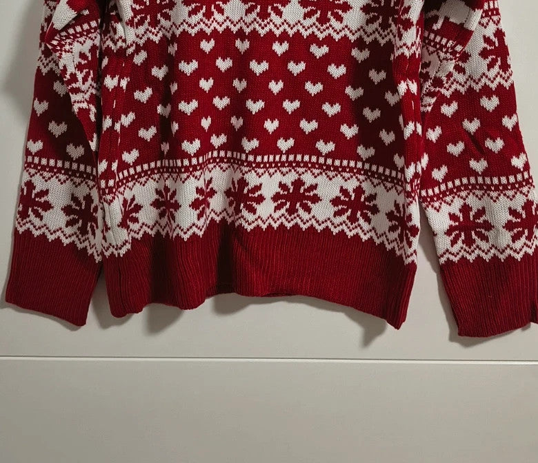 SheIn red and white Christmas sweater with reindeer, snowflakes, and ribbed cuffs.
