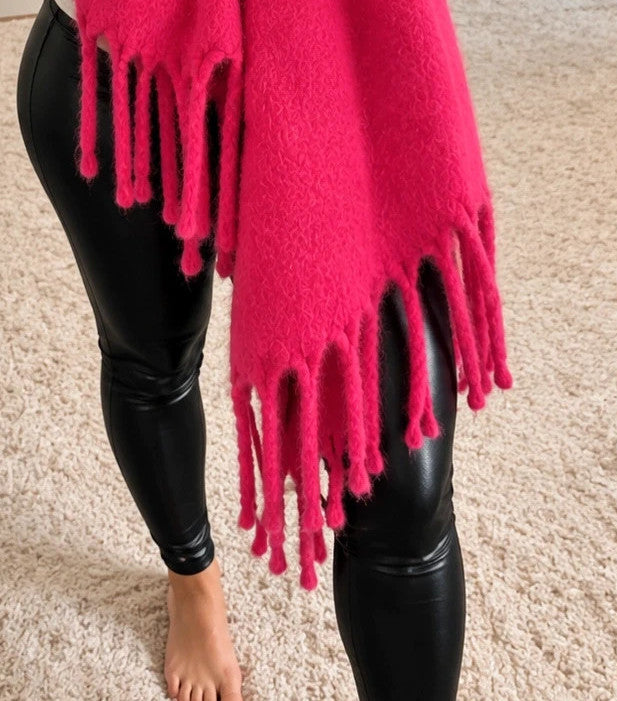 XXL pink fuchsia oversized scarf with long decorative fringes and soft fluffy texture.