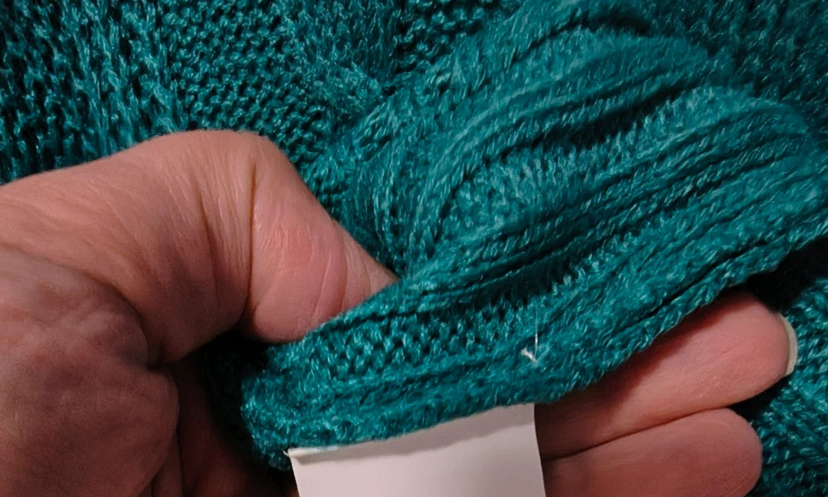Pullover blue-green hoodie with cable knit pattern and ribbed cuffs, size L fits like M.