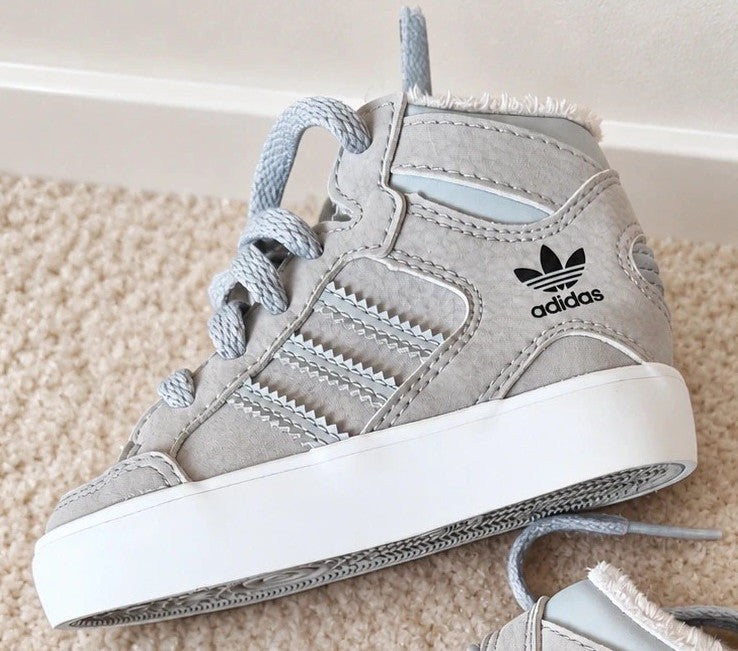 Adidas high top sneakers grey with soft lining, white rubber sole, and logo detail.