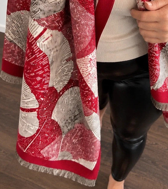 Creme shawl red, cream, grey with decorative leaf pattern and fringed edges.