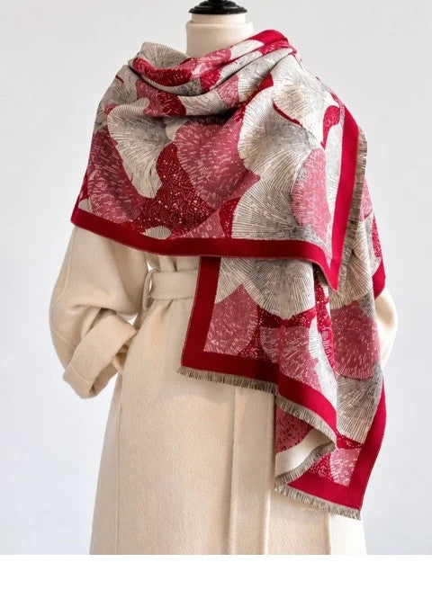 Creme shawl red, cream, grey with decorative leaf pattern and fringed edges.