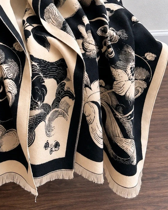 Creme black and cream shawl with floral pattern, soft polyester fabric.