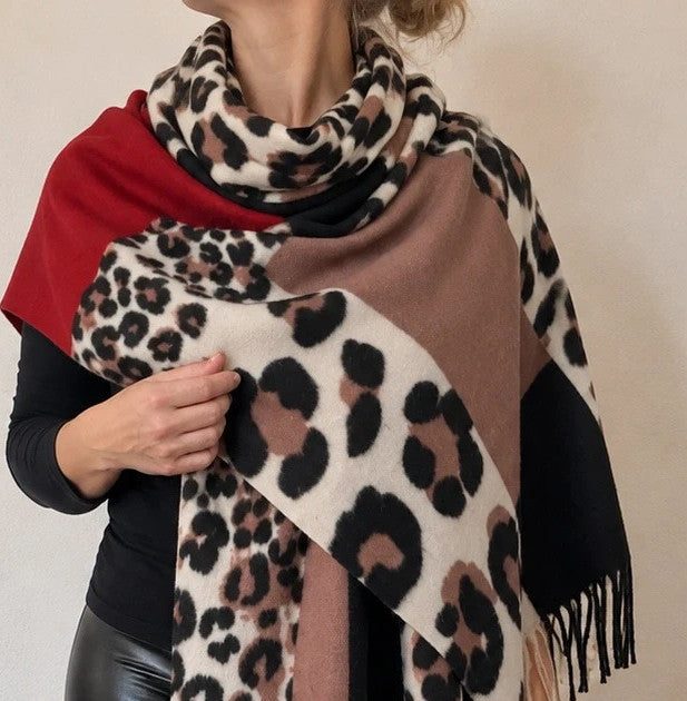 Muster multi shawl leopard print with fringe in red, beige, brown, cream, and black.