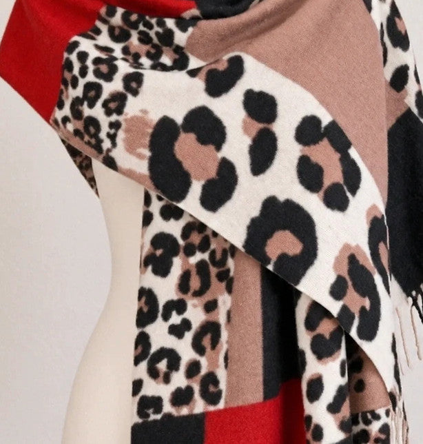 Muster multi shawl leopard print with fringe in red, beige, brown, cream, and black.