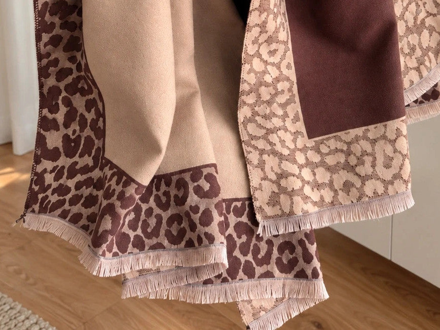 XXL beige brown shawl featuring decorative leopard pattern and soft fringed edges.