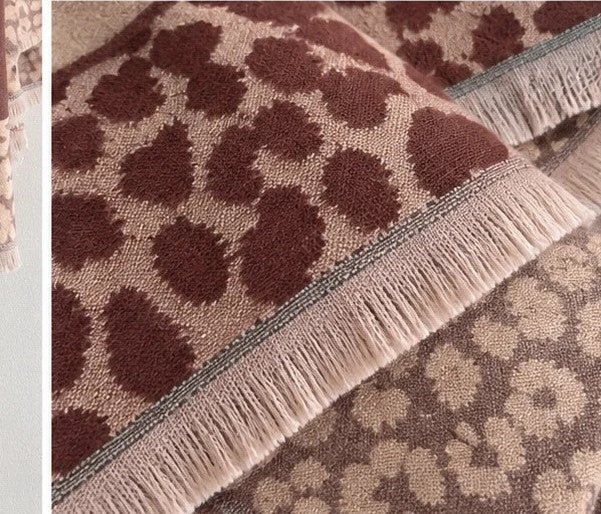 XXL beige brown shawl featuring decorative leopard pattern and soft fringed edges.