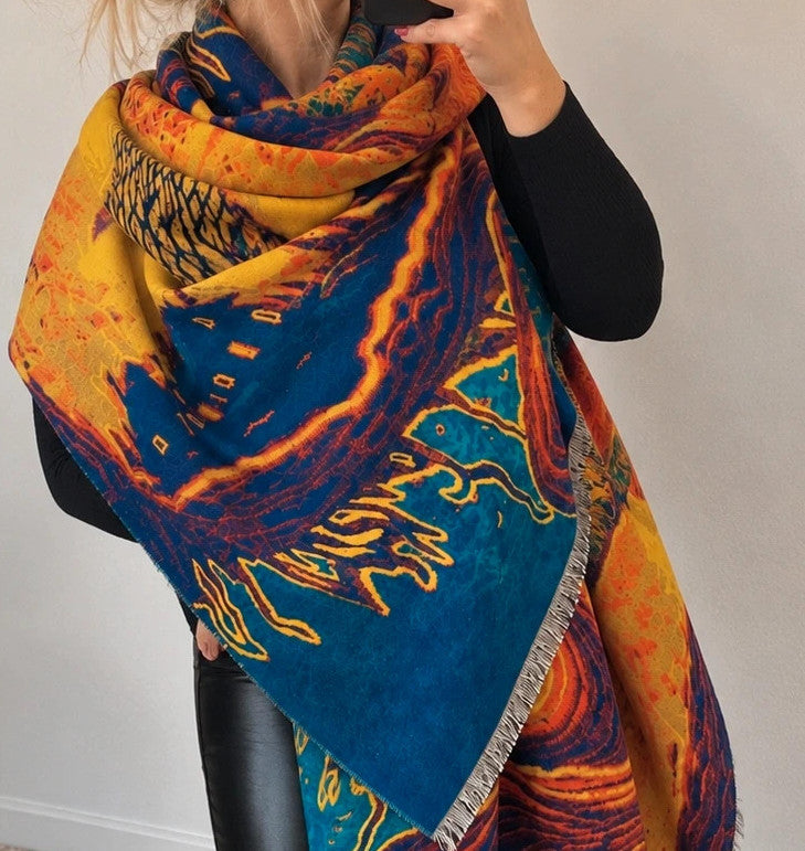 XXL multi shawl featuring a whimsical landscape design with fringed edges.
