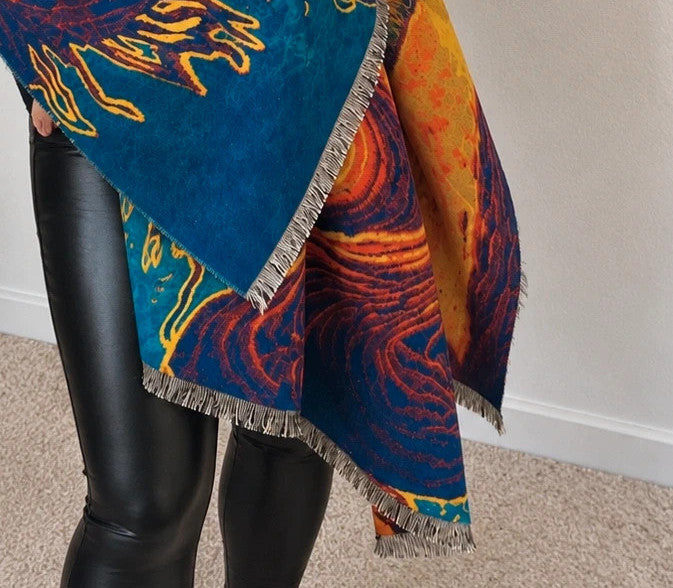 XXL multi shawl featuring a whimsical landscape design with fringed edges.