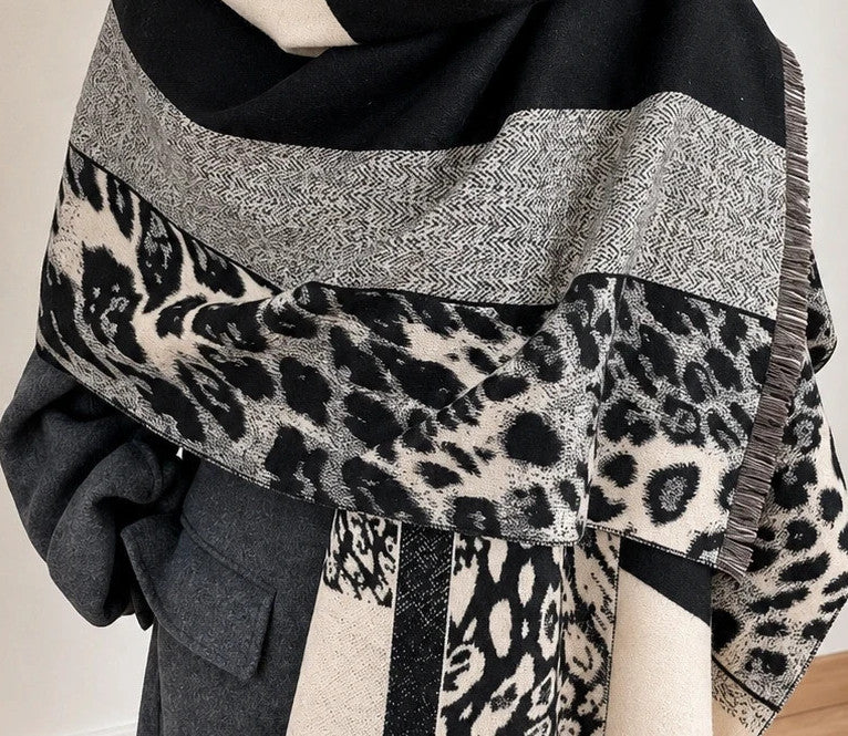beige shawl black cream leopard print geometric patterns with fringe details