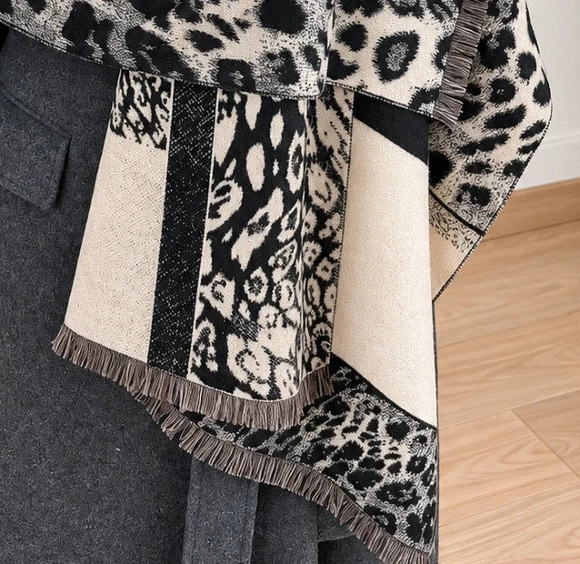 beige shawl black cream leopard print geometric patterns with fringe details