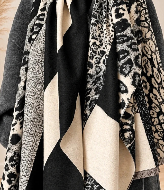 beige shawl black cream leopard print geometric patterns with fringe details