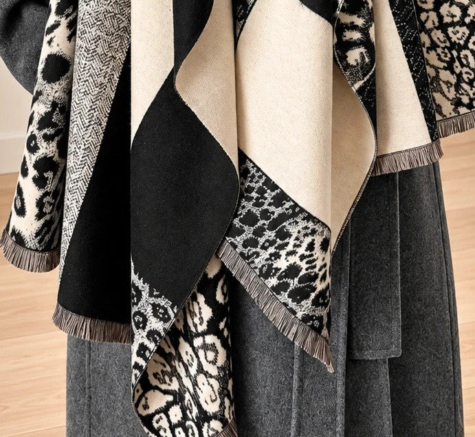 beige shawl black cream leopard print geometric patterns with fringe details