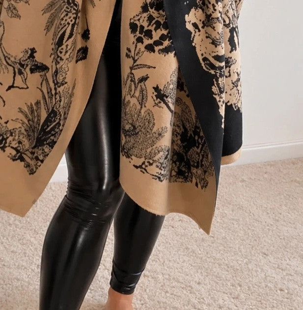 Beige shawl with black floral pattern, soft polyester material, versatile design.