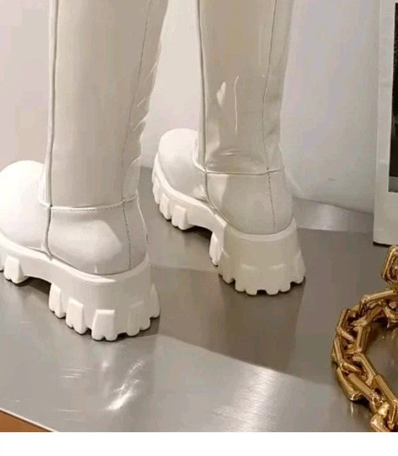 REI white knee-high glossy synthetic boots with chunky plateau sole, size 38.