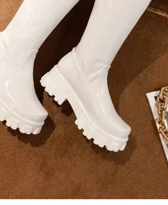 REI white knee-high glossy synthetic boots with chunky plateau sole, size 38.
