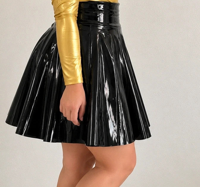 Che black high waist pleated skirt in glossy patent finish with back zipper.