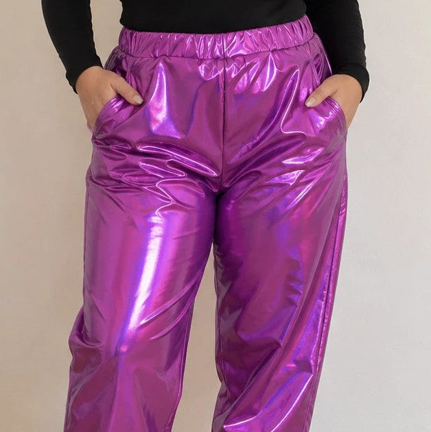 Lila purple jogging pants with shiny finish and fitted silhouette, featuring a smooth surface.