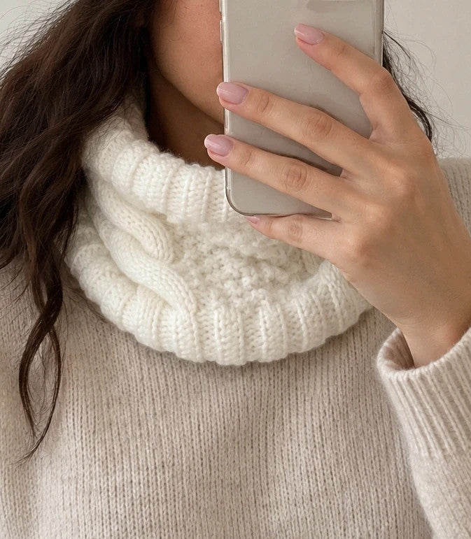 Off-White cream hat and neck warmer set with cable knit pattern, soft polyester material.