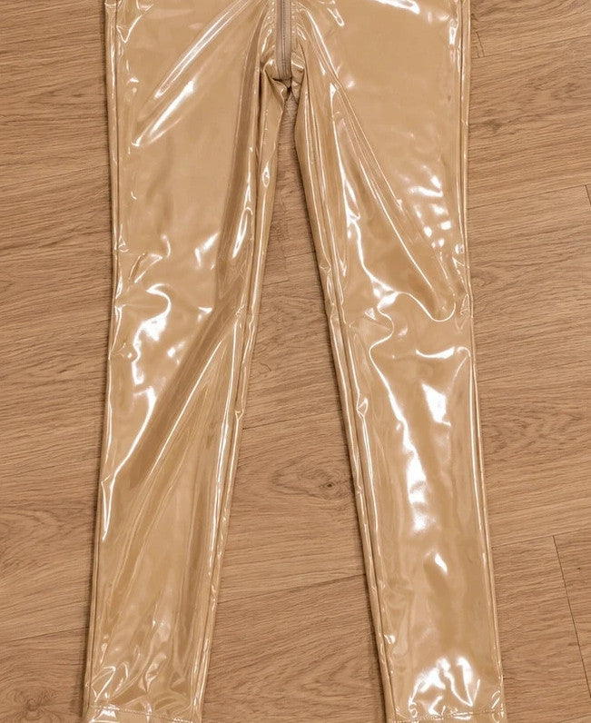 XXL beige jumpsuit with long sleeves, standing collar, and body-hugging fit.