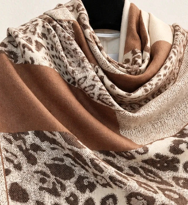 Muster beige brown shawl leopard pattern soft polyester with decorative fringes.