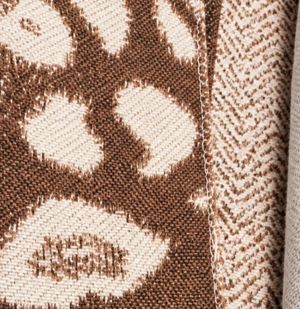 Muster beige brown shawl leopard pattern soft polyester with decorative fringes.