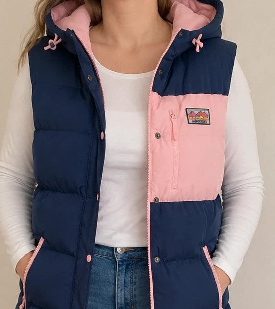 Lagooners navy vest with pink accents, quilted design, logo on chest, hooded.