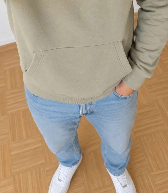 Bench green hoodie with rubber logo, kangaroo pocket, and thumbholes.