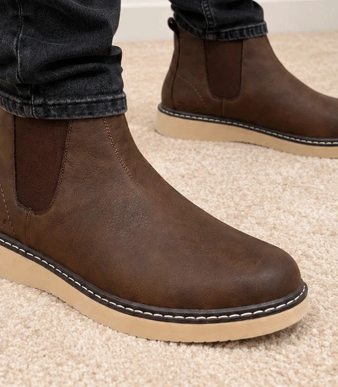 MCS brown winter boots size 43 with elastic side panels and cream-colored sole.