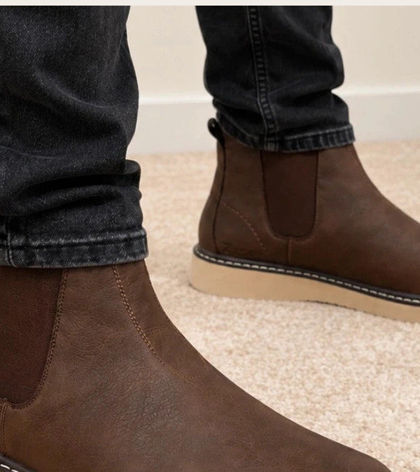 MCS brown winter boots size 43 with elastic side panels and cream-colored sole.